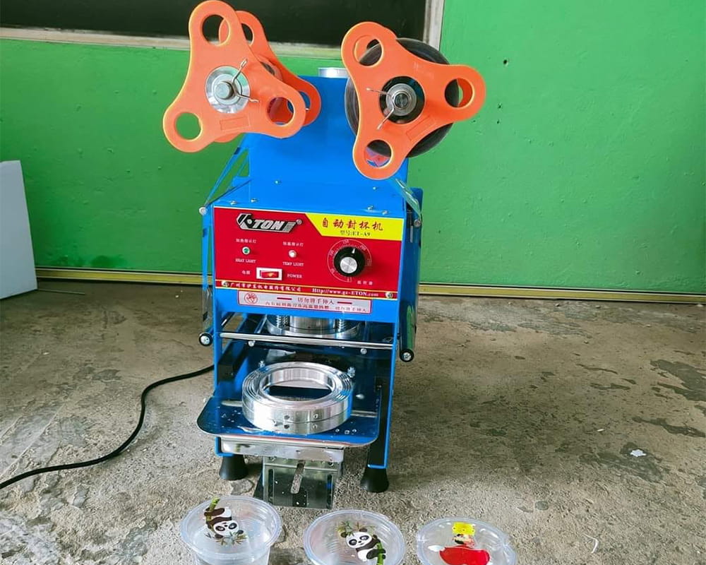 Máy kít ly nhựa tại TPHCM